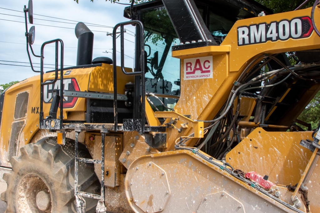 Road scraper machine • Photo by Mary-Ann Zykin