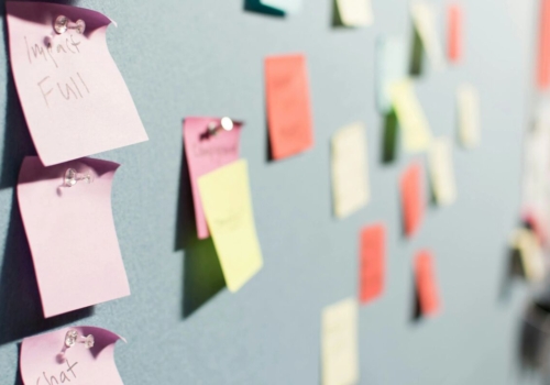 Sticky notes on a bulletin board