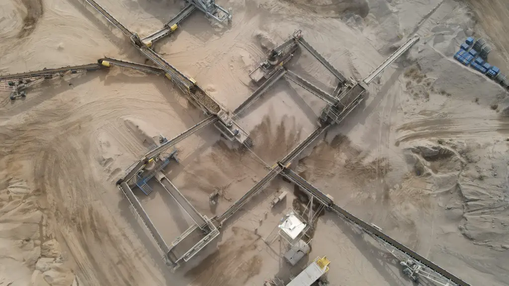 An aerial view of a construction site with aggregate crushing plant.