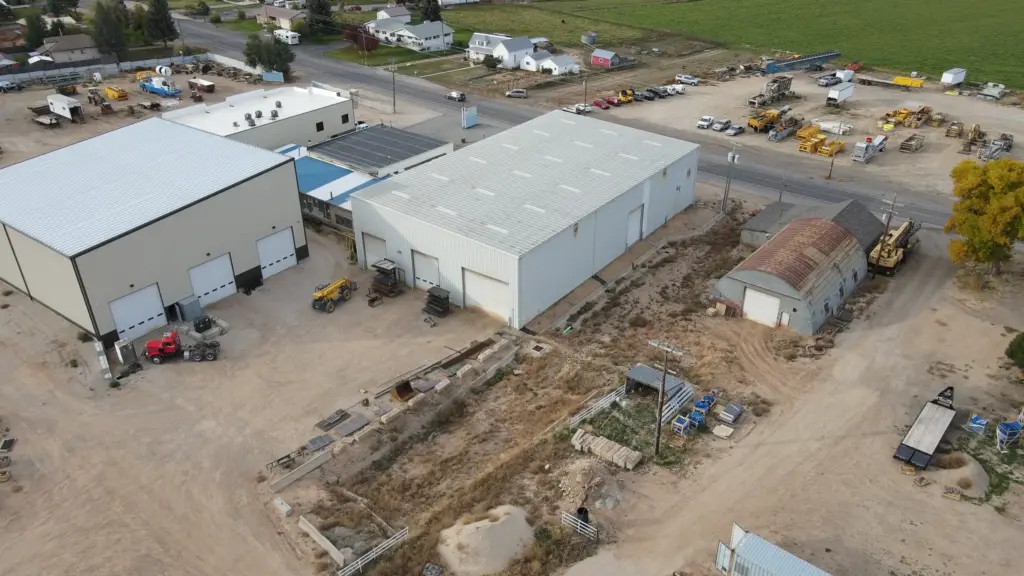 An aerial view of a construction company's headquarters and equipment lot.